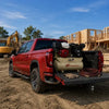 Ingersoll Rand 2475F13GH 13 HP Honda gas-powered two-stage air compressor mounted in a pickup truck at a construction jobsite