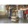 Ingersoll Rand P1IU-A9 2 HP portable twin-stack air compressor positioned on the floor of a professional workshop
