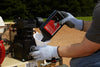 Adding lubricant to the compressor pump of an Ingersoll Rand SS3J5.5GH-WB 5.5 HP gas-powered wheelbarrow air compressor